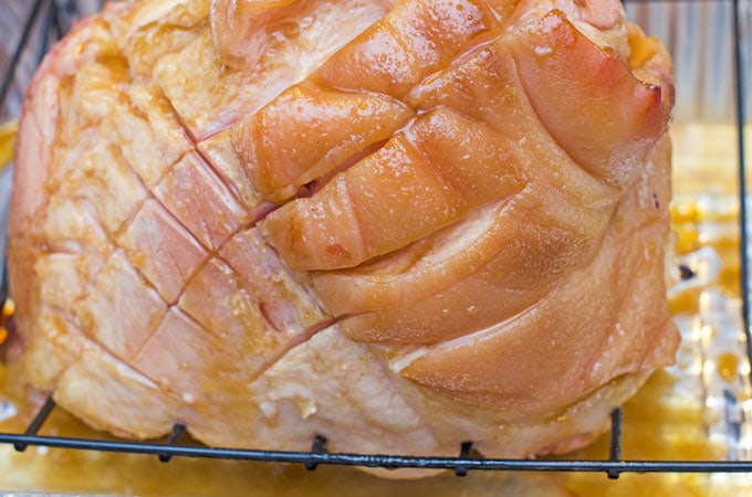 Brown Sugar Ham Glaze Recipe | Whether it's for Easter brunch, Thanksgiving lunch or Christmas dinner, this ham glaze recipe is full of sticky flavor that you can enjoy all year long. Not only is this brown sugar ham glaze delicious, but it also gives your ham a beautiful sheen to really impress your guests. Brown Sugar Ham Glaze Recipe | Whether it's for Easter brunch, Thanksgiving lunch or Christmas dinner, this ham glaze recipe is full of sticky flavor that you can enjoy all year long. Not only is this brown sugar ham glaze delicious, but it also gives your ham a beautiful sheen to really impress your guests.