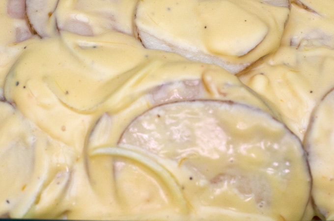 Cheesy Scalloped Potatoes Recipe | This easy scalloped potatoes recipe is full of cheesy goodness. It’s great as a side dish for just about any meal, but especially during Thanksgiving and Christmas with ham or a standing rib roast. I’ll admit I even like to eat the leftovers for breakfast! Cheesy Scalloped Potatoes Recipe | This easy scalloped potatoes recipe is full of cheesy goodness. It’s great as a side dish for just about any meal, but especially during Thanksgiving and Christmas with ham or a standing rib roast. I’ll admit I even like to eat the leftovers for breakfast!